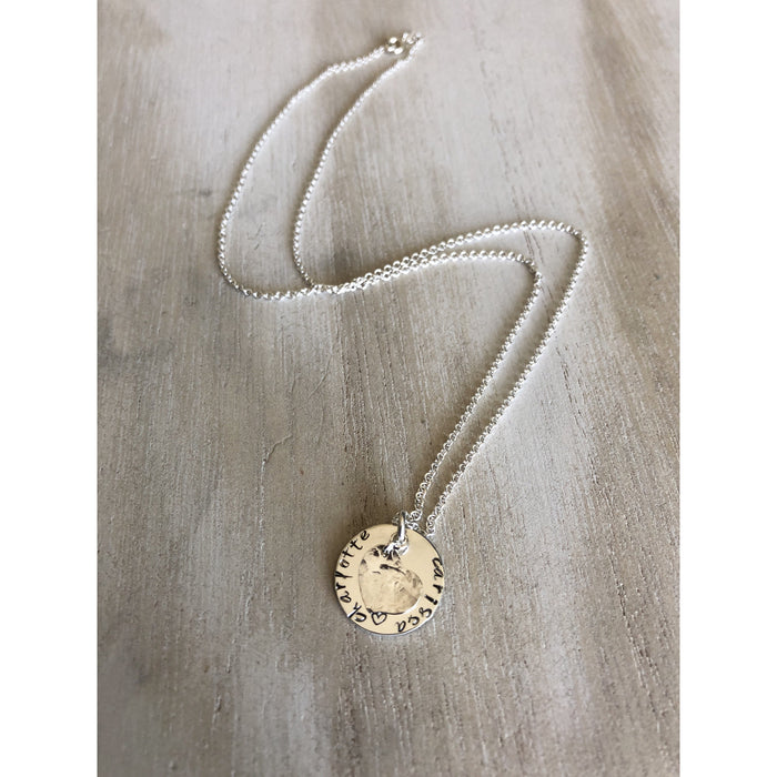 Sterling Silver Mother’s Name Necklace featuring hammered heart